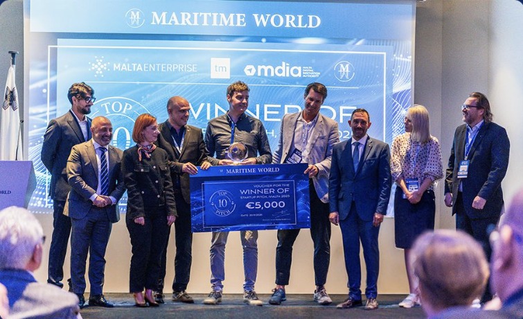 Top 10 Startup Pitch winner on stage with the Maritime World Malta Show 2025 award check